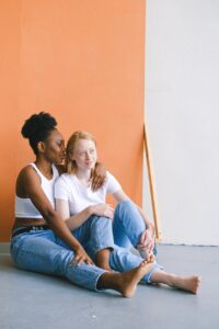 Couple sitting on the floor